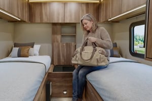 woman-storing-luggage-in-rv