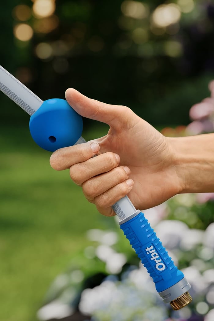 orbit-hose-reel_hand-holding-hose